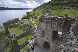 The ruins of Urquhart Castle beside Loch Ness near Drumnadrochit, Scotland, UK