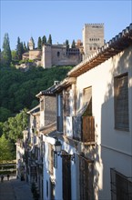 Cuesta de la Victoria street in the Albaicin district, Granada, Spain view over to the Alhambra