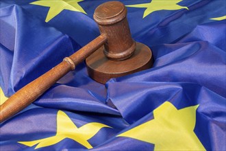 Symbolic image: Judge's gavel on a flag of the European Union