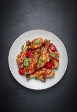 Fried chicken legs, in soy sauce, spices, herbs, top view, homemade