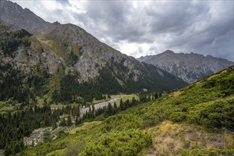 Green mountain valley with river and steep mountain peaks, Chong Kyzyl Suu Valley, Terskey Ala Too,