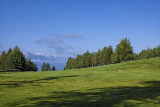 Crans Sur Sierre Golf Course with Mountain View in Crans Montana in Valais, Switzerland, Europe