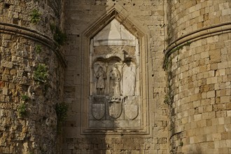 City wall, Thalassini Tor, Historic stone wall with detailed relief and sculptures, showing