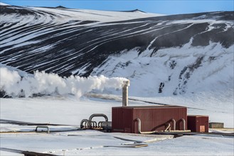 Detail of Krafla geothermal power plant, near Lake Myvatn, hot steam, snow, winter, Iceland, Europe