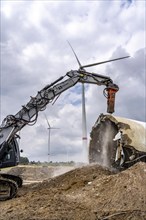 Demolished tower of a 20 year old wind turbine, in the Werl wind farm, 5 old Enercon E-66 turbines