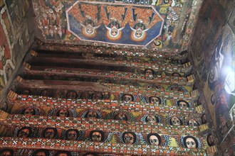 Amhara region, near Gondar, Gonder, mural painting, church ceiling with angel heads and cross