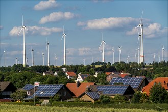 Wind farm near the East Westphalian town of Energiestadt Lichtenau, many residential buildings with