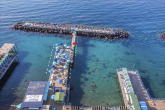 Bathing jetties below the cliffs, Sorrento, Sorrento Peninsula, Gulf of Naples, Campania, Italy,