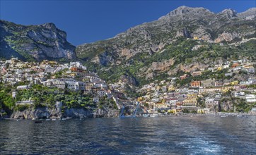 View from the boat of the village on the cliffs above the sea, Positano, Amalfi Coast, Amalfitana,