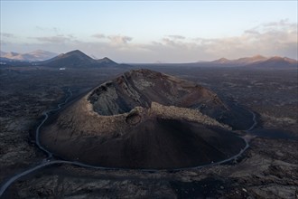 Aerial view of the El Cuervo volcano at sunrise, Lanzarote, Lanzarote, Canary Islands, Spain,