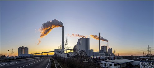 Mannheim coal-fired power station on a cold winter's day, plumes of smoke above the chimneys.