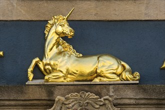 Golden Unicorn above the portal of the Unicorn Pharmacy, Pharmacy Museum, Blue House, Old Town,