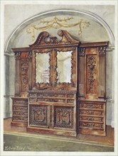 Furniture around the turn of the century 1900, Carved enclosed mahogany bookcase in the Chippendale