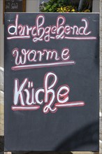 Information board in front of a restaurant, hot meals all day, Erlangen, Middle Franconia, Bavaria,