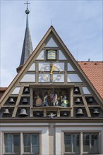 Glockenspiel with running figures at the Bürgerspital, inaugurated in 1956, Würzburg, Lower