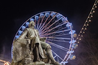 Monument to Otto von Guericke, physicist, behind him Ferris wheel, Magdeburg, Saxony-Anhalt,