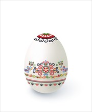 Floral motif painted Easter egg over white background, vector illustration