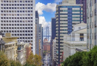 San Francisco, California street and cable cars that connect financial district and upper town