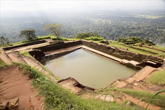 Bathing pool in rock palace fortress on rock summit, Sigiriya, Central Province, Sri Lanka, Asia