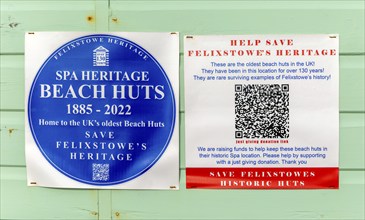 Information campaign posters to save spa heritage historic beach huts, Felixstowe, Suffolk,