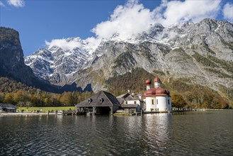 Königssee with Watzmann massif and pilgrimage church St. Bartholomä, autumnal mountain landscape,