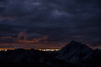 Montafon mountains with dramatic cloudy sky at sunrise, Tschagguns, Rätikon, Montafon, Vorarlberg,