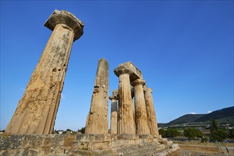 Archaic Temple of Apollo, Doric Columns, Historic columns against a picturesque backdrop of nature