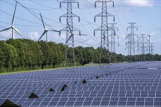 High-voltage power line route, the space underneath is used for a solar park over 5 km long, behind