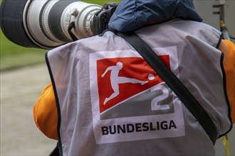 20 April 2024, Kaiserslautern: Photographer at a Bundesliga 2 match