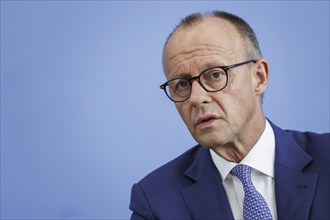 Friedrich Merz, CDU party chairman, at the Federal Press Conference on the consequences of Solingen