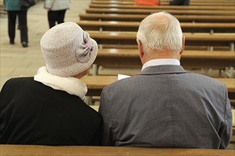 Faithful couple in a church service