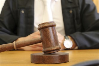 Close-up of a judge's gavel as a symbolic image for a court judgement