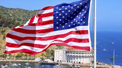 American star spangled flag waving in California. A large American flag is flying high above