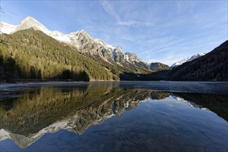 Winter on an icy lake, Lake Antholz in the Antholz Valley, Val Pusteria, South Tyrol, Italy, Europe