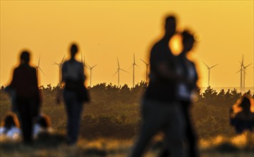 The Drachenberg in Berlin is well visited at sunset. A wind farm near Nauen in Brandenburg can be