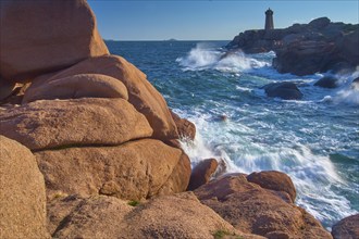 Lighthouse, Phare de Mean Ruz or Phare de Ploumanach, in the foreground rocky coastal landscape,