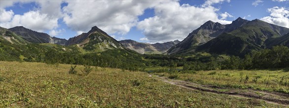 Beautiful panorama mountain landscape of Kamchatka Peninsula: early autumn view of Mountain Range