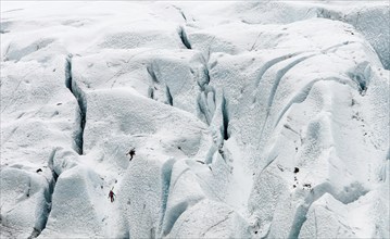 Unrecognised people hiking the vantajokull glacier skaftafell national park in Iceland Europe