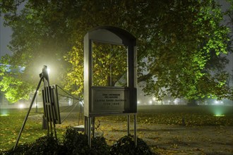 Dresden's old town shrouded in November fog. Brühl's Garden. Caspar David Friedrich monument by