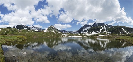 Beautiful landscape of Kamchatka Peninsula: summer panoramic view of Mountain Range Vachkazhets,