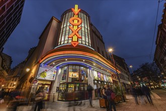 The Vox cinema in Strasbourg illuminated at night. Bas-Rhin, Alsace, Grand Est, France, Europe