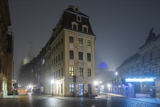 Dresden's Old Town shrouded in November fog. Rampische Straße, foggy atmosphere in Dresden,