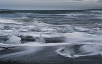 Icebergs from Vatnajokull glacier, drop into Jokulsarlon lake and then to the Ice beach in Iceland.