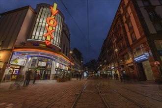 The Vox cinema in Strasbourg illuminated at night. Bas-Rhin, Alsace, Grand Est, France, Europe