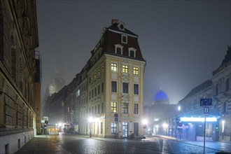 Dresden's Old Town shrouded in November fog. Rampische Straße, foggy atmosphere in Dresden,