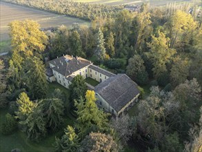 Aerial view of the sant'agata villa, the house of giuseppe verdi, surrounded by colorful autumn