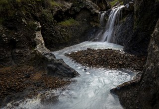 River with blue polluted water. Water contamination for copper mine