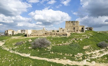 Drone aerial view of an abandoned deserted village. Ruins of deserted old town. Petrofani,