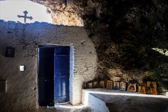 Protaras, Cyprus, August 6 2020: Interior of an old church cave with Christian saint. Ayioi Saranta