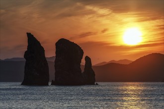 Kamchatka seascape: beautiful view of Three Brothers Rocks in Avachinskaya Bay (Pacific Ocean) at